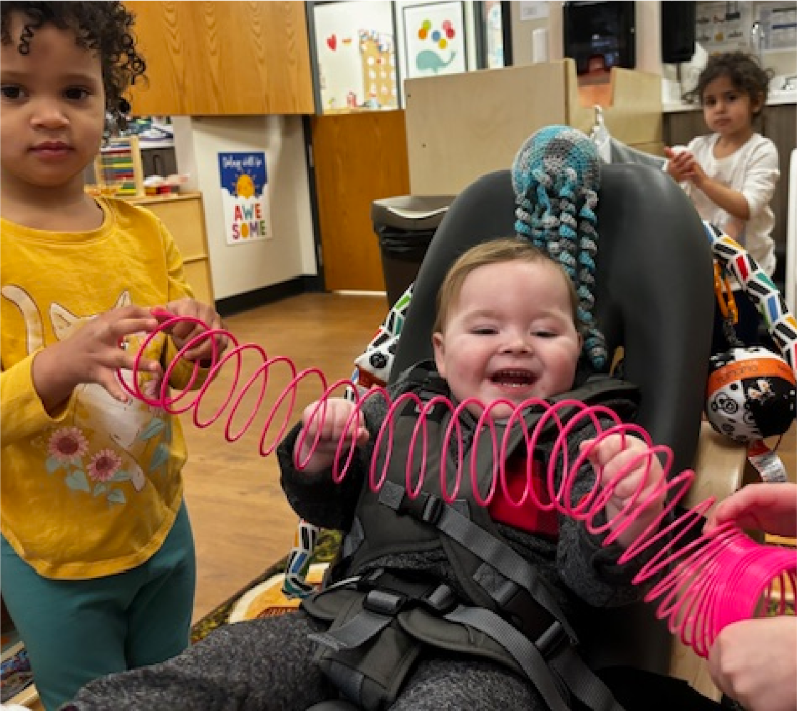 Student in the Prescribed Pediatric Extended Care program playing in our fully integrated daycare classrooms.